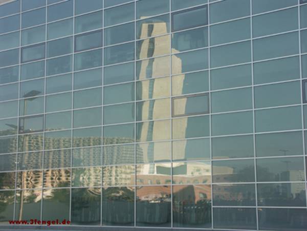 skyscraper mirrored in a glas front in chemnitz 