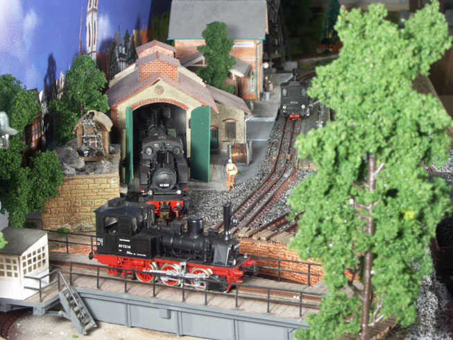 depot in Rheinheim with Engine T3 on the turntable, engine 92 at the engine house an another T3 at the platform on track 1